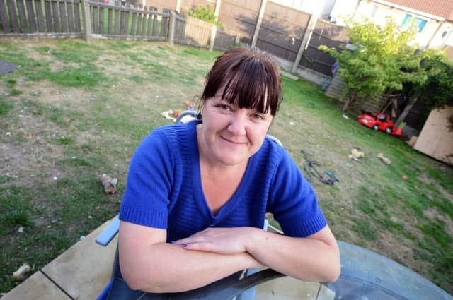 Angela Flynn who is hoping to raise money for garden improvements in aid of her son.