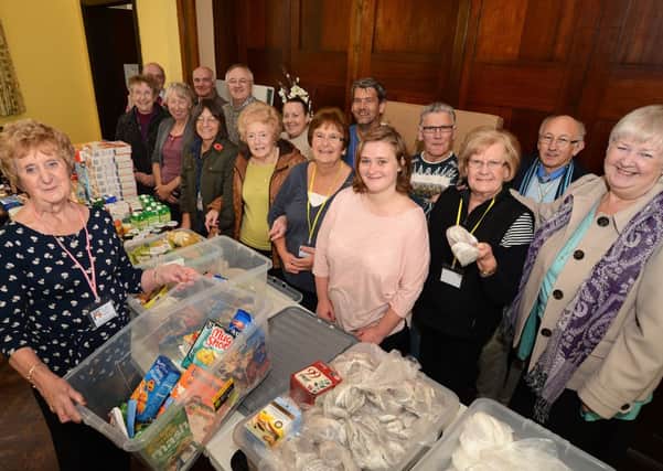 Joan Henson, left and her team of volunteers who help at the St. John's Church Hall food bank in Annesley.