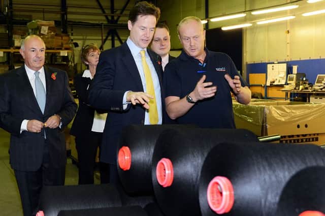 Deputy Prime Minister, Nick Clegg, chats with team leader, Dwaine Butler.