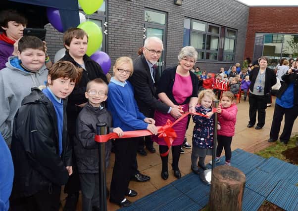 Stubbin Wood School official opening which saw the Leader of Derbyshire County Council Anne Western cut the ribbon with head teacher Lee Floyd watched by pupils and assembled guests.