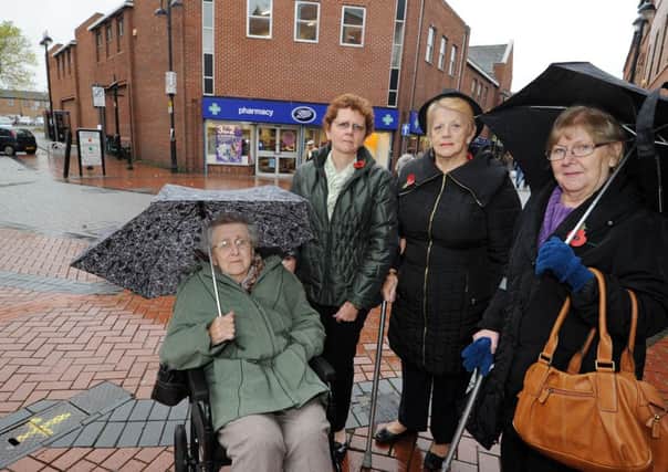 Campaign to stop traffic through Bulwell Town centre. Pictured in wheelchair is 84 year old May Richards who was hit by a car in this area. l-r is Jill Downing (May's daughter), Jill Downing, Cllr Jackie Morris and Cllr Ginny Klein.
