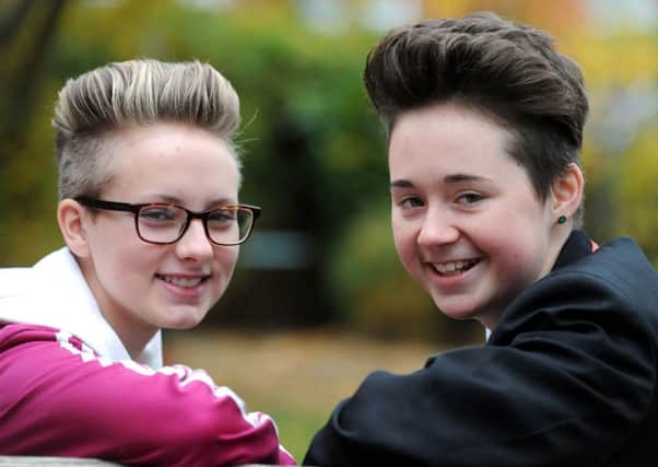 Samworth students Abby Huxley 14 (in uniform) and Courtney Redfern 15 (blonde) have been excluded from school for 3 days because of their hairstyles.