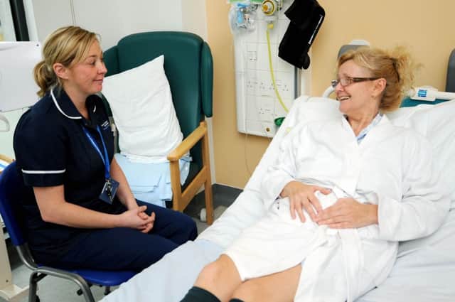 Care and comfort rounds being introduced at King's Mill to better care for patients. Kerry Moore Practice Development Matron with patient Susan Guest from Hucknall.