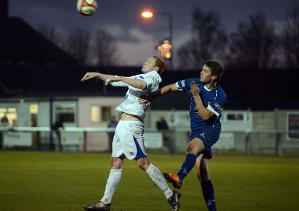 Rainworth's Sam Saunders in action against Sutton Coldfield Town.