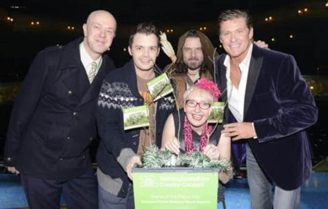 Councillor John Knight, Culture Committee Chairman, Nottinghamshire County Council, Barney Harwood, Robin Hood (aka Ade Andrews) David Hasselhoff and Su Pollard, with the Major Oak saplings, direct descendants of the Major Oak, the 1,000 year old tree at Sherwood Forest.
