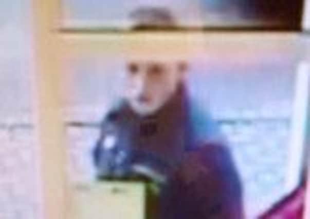 Police want to speak to this man in connection with a theft in Kirkby.