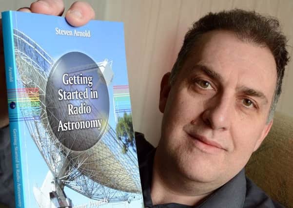 Steve Arnold with his book on Radio Astronomy.