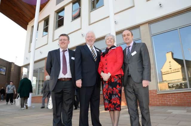 Mansfield's Executive Mayor Tony Egginton opens the new Queen's Place on Queen Street. Pictured are Marc Hollingsworth, Mayor Tony Egginton, Coun Kate Allsop, Portfolio holder for Economic Regeneration and Mike Robinson, Head of Regeneration G131121-2c