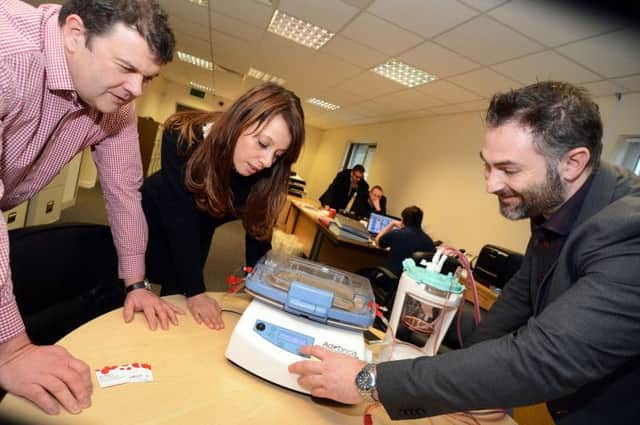 Ashfield MP Gloria De Piero chats with managing director Stephen Cotton, left, and sales manager Ben Williams, during her visit to Brightwake in Kirkby.