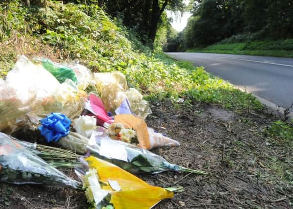 Flowers laid in memory of Luke Winter at the site of the crash.