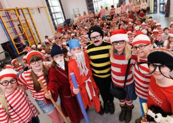 Where's Wally Day at King Edwin Primary School, Edwinstowe for World Book Day. Pictured front l-r are prize winners, Charlie Sheppard 7, Emily Freeman 10, Emily Hubball 10, Thomas Harney 10, Oliver Goodman 11, Abigail Statham 8, Nathan Roe 9, Lucas Simpson 8.