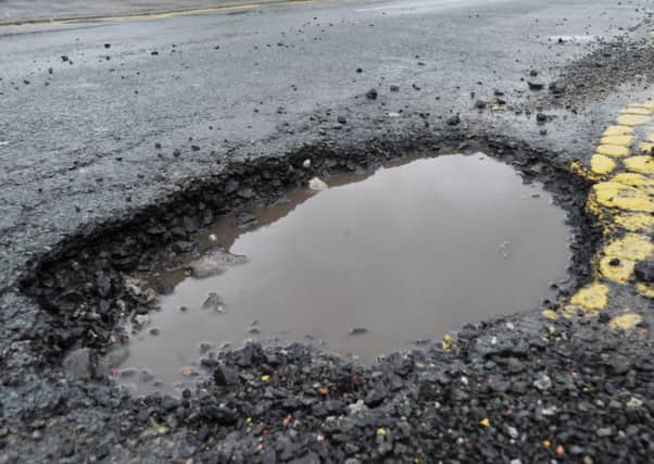 A huge pothole on Wilton Avenue
