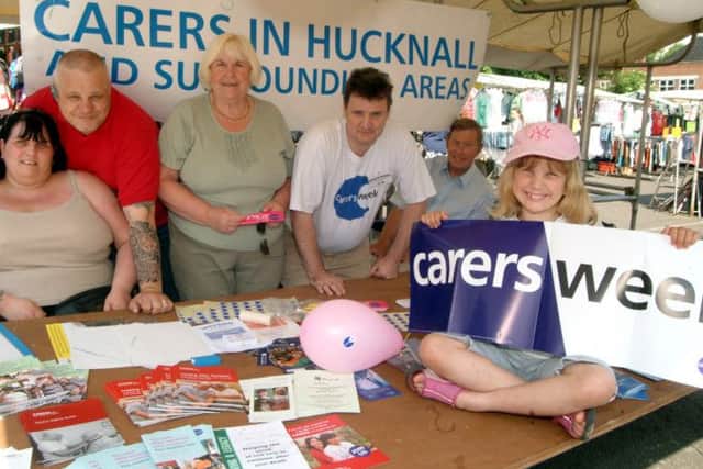 06-1320-1Carers In Hucknall ran a stall on Hucknall Market on Friday to raise awareness of the group and its work as part of National Carers Week. Pictured L to R members, Lisa and David Brown, Cynthia Shaw, Chairman Jim Radburn, Ray Willmot and Caitlin Brown 6.
