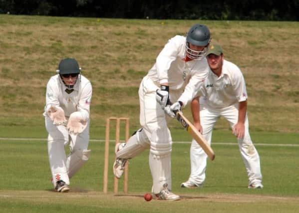 RG NMAC13-1213-2

Welbeck v Hosiery Mills at Sookholme on Sunday
Welbeck's Oliver Pringle who shared a century opening partnership with Taylor Wright