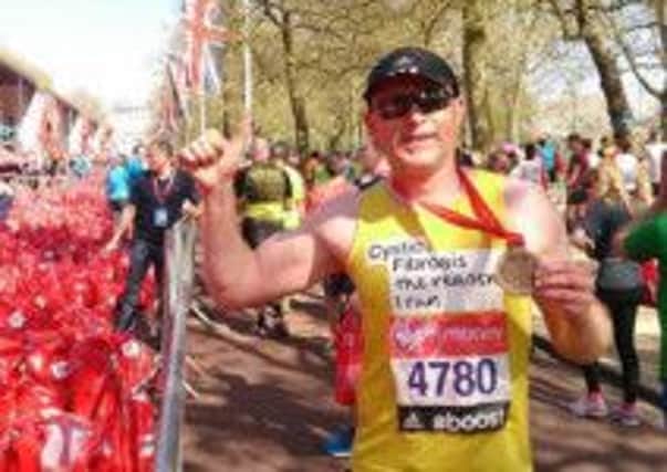 Fundraiser Martin Beresford after completing the London Marathon.