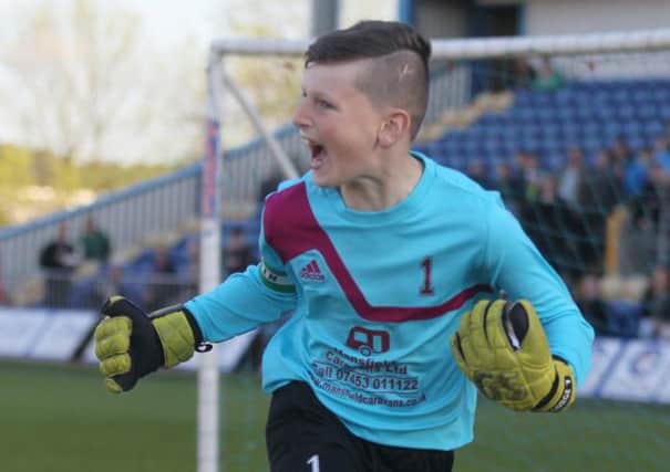 Joy for Welbeck 'keeper George Smith-Grout after he saves the last penalty -Pic by: Richard Parkes
