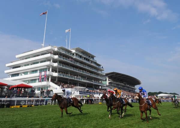 SETTING FOR A CLASSIC -- Epsom Downs racecourse, which will stage the Investec Oaks (PHOTO BY: Nigel French/PA Wire).