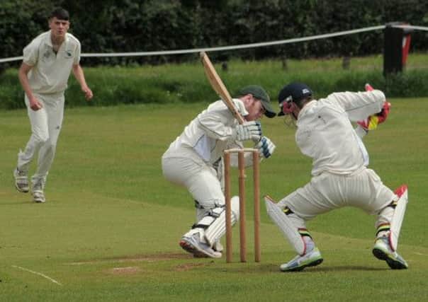 Edwinstowe  V  Farnsfield, Cricket played at Edwinstowe.
Edwistowe are pictured Batting. 6. Tricky moment for James Dobson