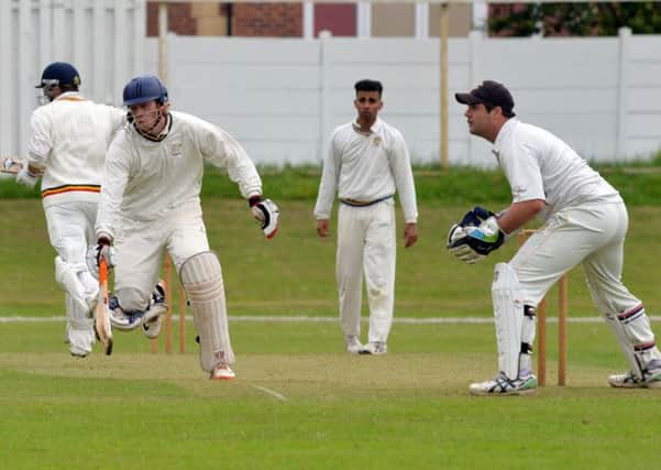 Worksop v Thoresby, pictured is Thoresby bowler Akib Farooq and Worksop batsman  Luke Ambrose