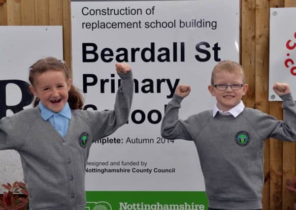Stone laying ceremony for the new Beardall Street School, pictured are Jenna Slater, eight and Declan Roberts, eight at the site in their new school uniform