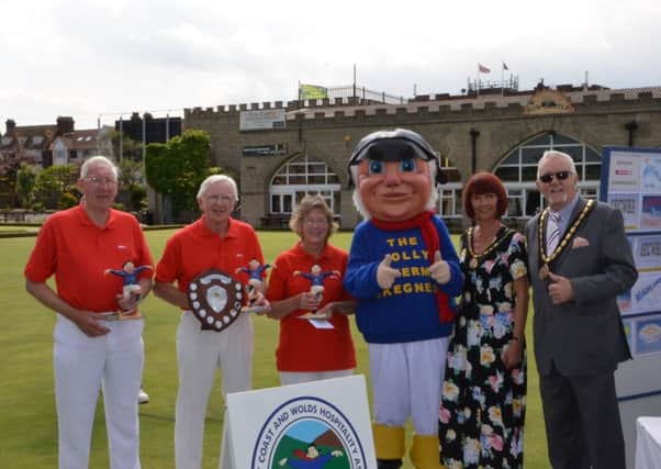 The Skegness Triples winners with the Jolly Fisherman and Mayor and Mayoress.