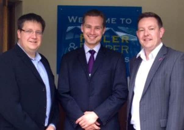 Richard Howard from Fidler & Pepper Solicitors (centre) with Scott Marsh and Mark Docherty, both Managing Directors of Respectful Care