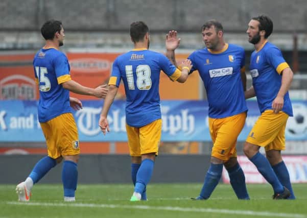 Matt Rhead is congratulated after scoring for the Stags -Pic by: Richard Parkes
