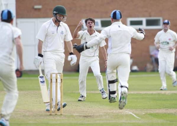 An estatic Lewis Bramley as he claims the wicket of Tom Rowe for Cuckney -Pic by: Richard Parkes