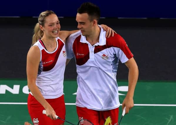 Gabrielle Adcock and Chris Adcock celebrate winning their game against Malaysia in the mixed doubles. Picture by Peter Byrne/PA Wire.