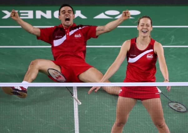 England's Chris Adcock and Gabrielle Adcock celebrate their win in the Mix Doubles Gold medal match. Picture by: Andrew Milligan/PA Wire.