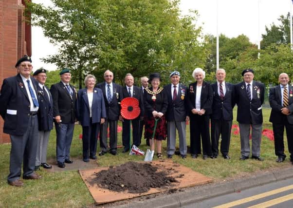 Tree planting to commemorate 40 years of Ashfield District Council and to mark the centenary of WW1, pictured is council chairman Coun Elizabeth Mays with members of the Royal British Legion