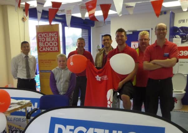 Staff from Wickes at Sutton who helped raise more than £300 for Lymphoma and Leukaemia Cancer Research in a gruelling cycle ride.