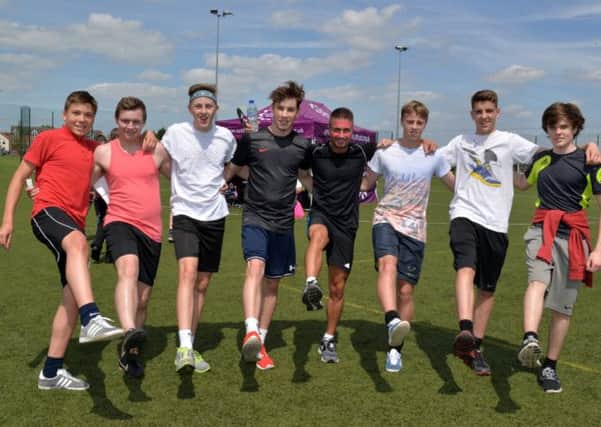 Students at Sutton Community Academy took part in Race For Life, raising money for Cancer Research UK. Some of the first runners back over the finish line
