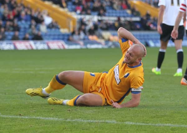 Frustration for Mansfield skipper Adam Murray as Accrington take all three points -Pic by: Richard Parkes