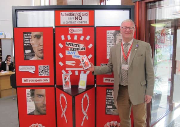 Ashfield council leader Chris Baron promotes the White Ribbon campaign against domestic abuse.
