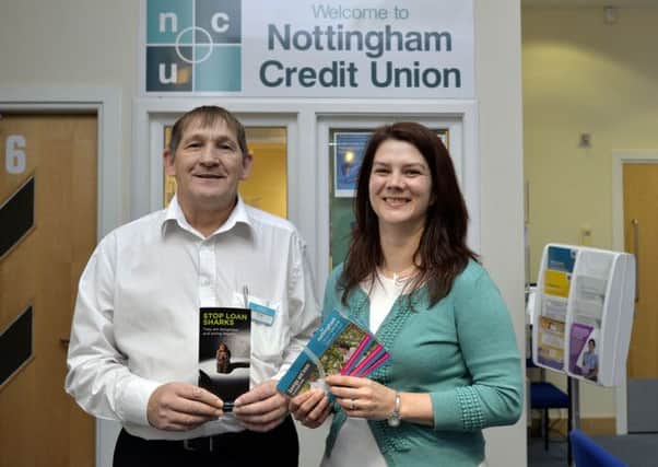 Nottingham Credit Union. volunteer Andy Stowe and manager Ella Ferris
