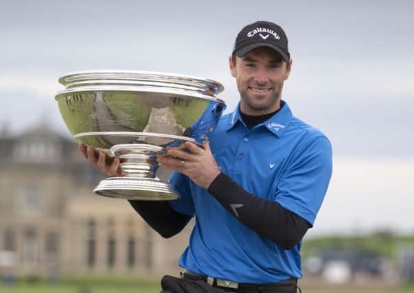 Oliver Wilson celebrates winning the Alfred Dunhill Links Championship at St Andrews Old Course. Picture by Kenny Smith/PA Wire.