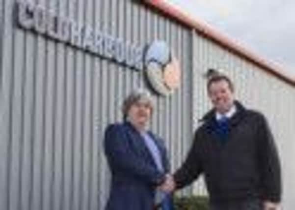 Andrew Marshall ( left), CEO Coldharbour Marine with Mark Spencer MP, at Coldharbour Marines new  HQ, Linby, Notts
