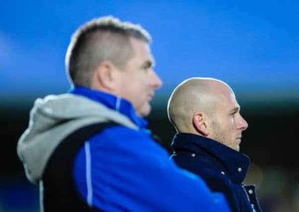 Micky Moore, left, with manager Adam Murray.