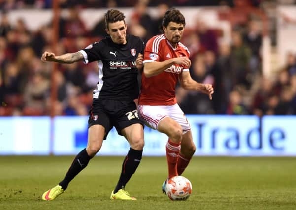 Nottingham Forest's Eric Lichaj (right) and Rotherham United's Matt Derbyshire (left) during the Sky Bet Championship match at the City Ground.