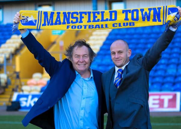 John Radford and Adam Murray celebrate the managerial appointment.