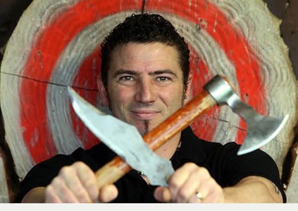 Daniel Mosley of Woodend Farm in Huthwaite at his axe and knife throwing  range
