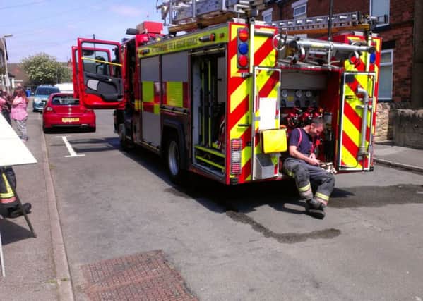 Firefighters at the scene following blaze at George Street, Mansfield.