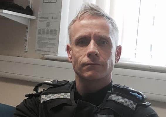 Sgt Simon Scales