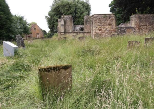 GRASSED OFF -- Annesley Old Church, pictured this week, almost hidden by the long grass.