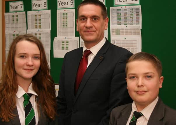 Holgate Mr Neil Holmes with students