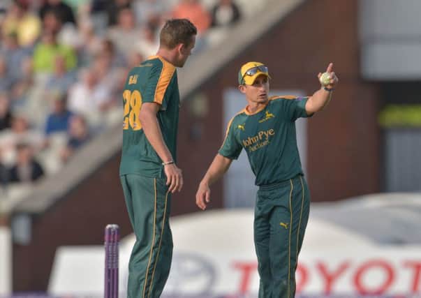 James Taylor and Jake Ball organise the fielding positions during the NatWest T20 Blast match between the Lightning and the Outlaws at Emirates Old Trafford, Manchester on 15 July 2015.  Photo: Simon Trafford
