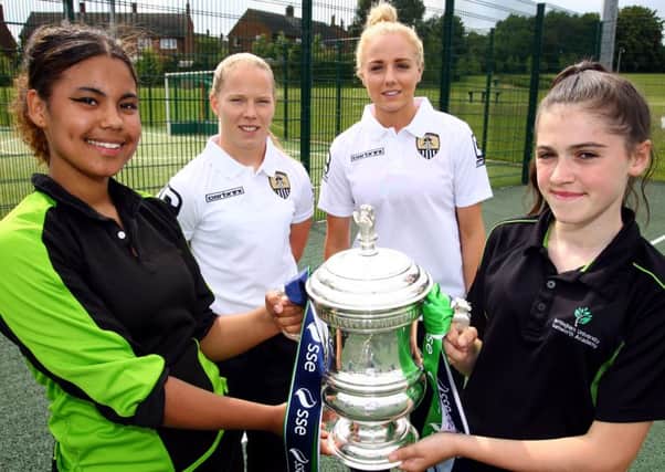 Notts County Ladies Players with the FA Cup at a training session at Samworth Academy, UK. 16th July 2015.