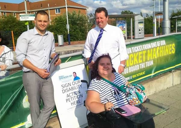 Emma Donaldson, of Hucknall who is campaigning for better disabled access at Kirkby Railway station, pictured with Sherwood MP Mark Spencer and Coun Ben Bradley.