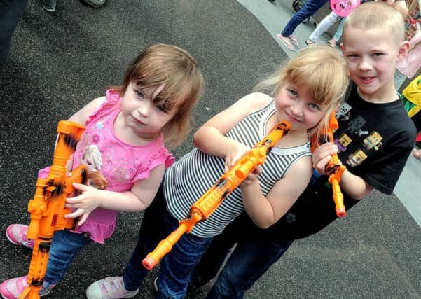 The local Autism group based at the Old Beardall Street School, Hucknall, held their Charity Family Fun day, at the school.
NHUD 1-8-15 Autism, Armed and ready,  Scarlett Newton (2), Amy Eaton (5) & Kelham Stevenson (8)       (3)